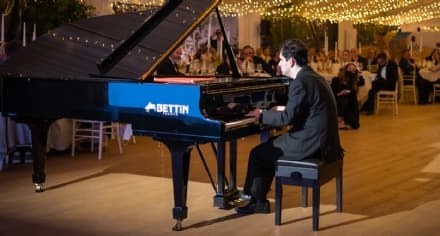 CUORGNE' - Concerto al buio, la «Trinità» si illumina di musica con Fabrizio Sandretto