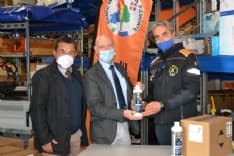 CUORGNE' - Azienda dona flaconi di liquido igienizzante ai volontari Aib