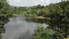 MONTALTO DORA - Due morti nel lago Pistono: sono caduti in acqua per recuperare un pallone