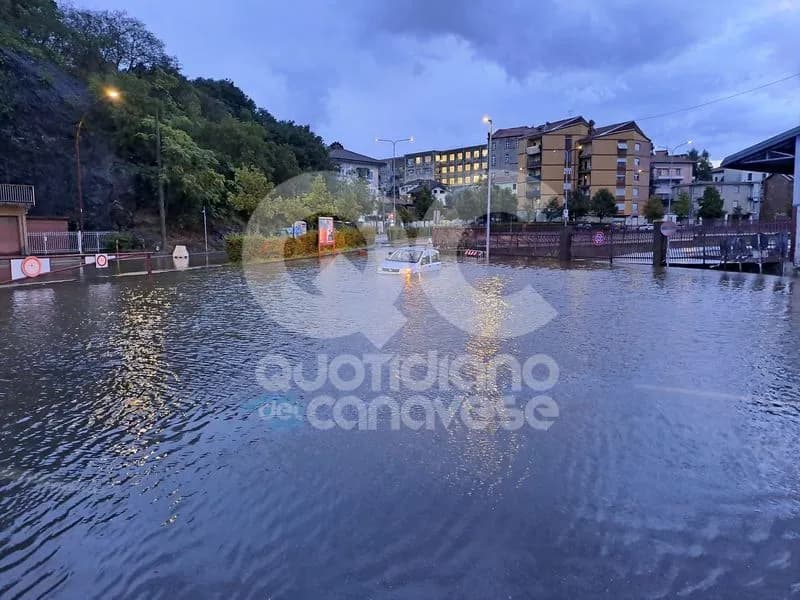 MALTEMPO IN CANAVESE - Estate finita: allagamenti nella zona di Ivrea, grandine ad Alpette, neve tra Serrù e Nivolet - FOTO